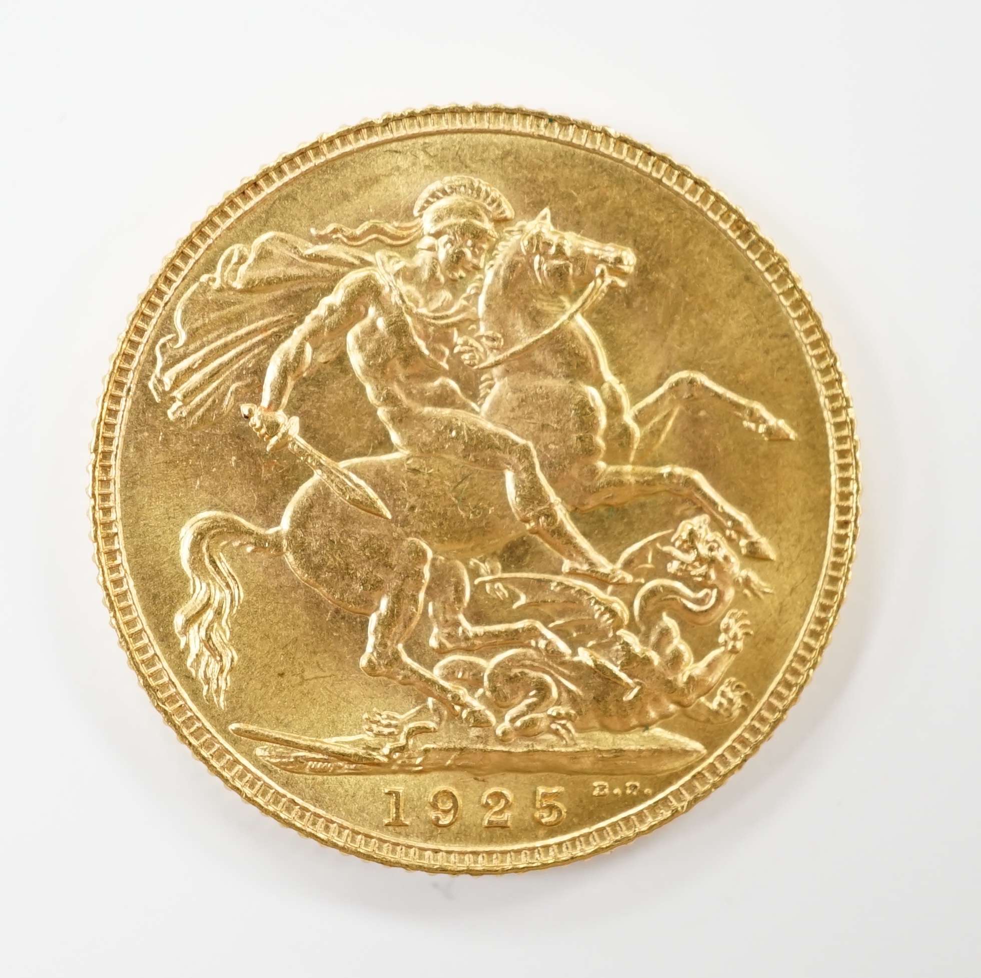 A George V 1925 gold sovereign.